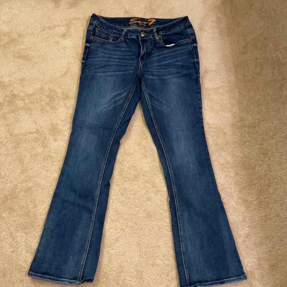 Seven7 Jeans. Bootcut with sparkles on back pockets.